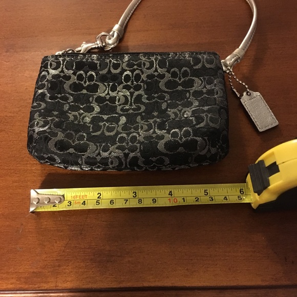 Coach Handbags - Small coach wristlet. Like new.  Black & silver.